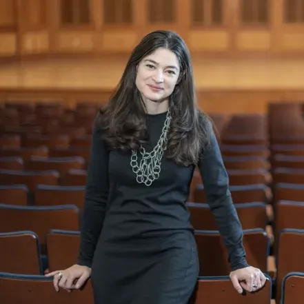 Leigh Fagin in an auditorium.